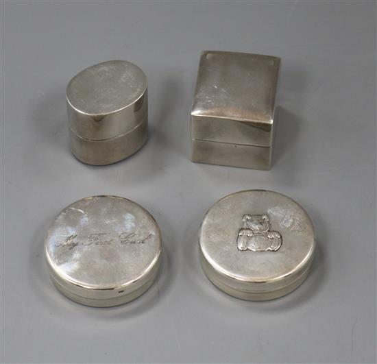 Two modern silver mounted ring boxes and two modern silver boxes including My First Curl.